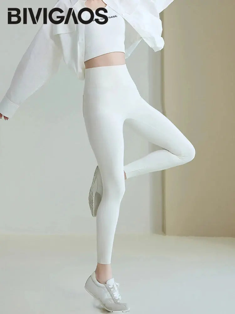 BIVIGAOS 2025 Printemps Été poche arrière Peau de requin Leggings femmes serré blanc Casual sport Fitness Leggings Leggings skinny pantalon MedSurgery Store For Digital Health